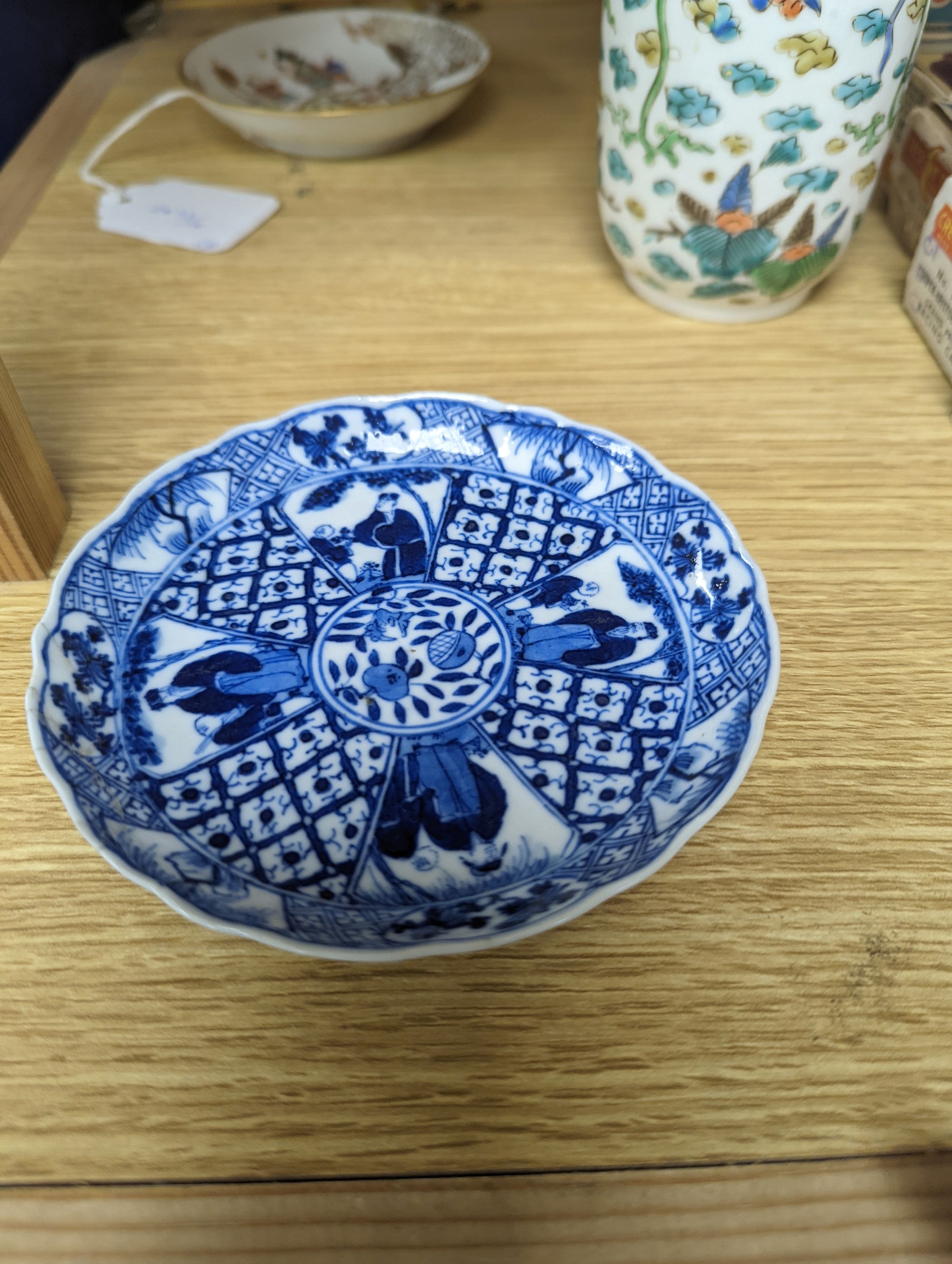 Two Chinese porcelain saucer dishes and an enamelled porcelain vase, 18th century and later, 12.5cm